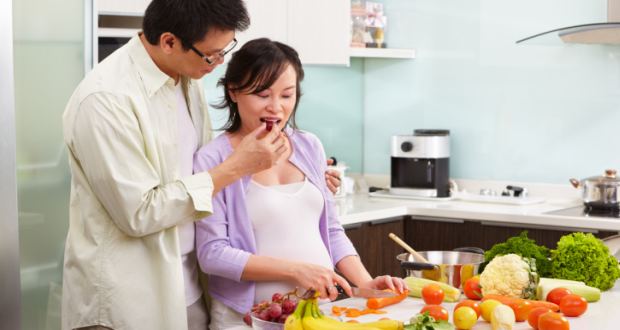 Asian couple activity in kitchen