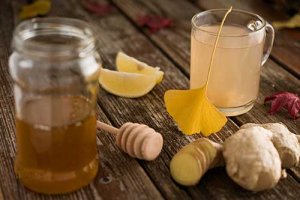 129677565-common-cold-folk-medicine-ginger-root-honey-and-lemon-tea